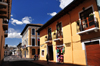 Quito, Ecuador: commerce on Calle Benalczar - Hotel Benalczar - looking towards Plaza San Francisco - photo by M.Torres