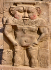 Dendera / Denderah / Lunet / Tantere - near Quina, Minya Governorate, Egypt: god Bes /  Bisu in the temple complex - Roman period - photo by G.Frysinger