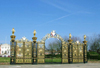 Warrington, Cheshire, England, UK: The 'Golden Gates' with statues of Nike, the goddess of victory - the gates were made by the Coalbrookdale Foundry - Bank Park - photo by D.Jackson