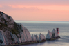 Isle of Wight, South East England, UK: Alum Bay and the needles - chalky peninsula and Needles Lighthouse with its helipad - photo by I.Middleton