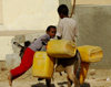 Eritrea - Keren, Anseba region: going to a well to get water - children on a donkey with plastic tanks - photo by E.Petitalot