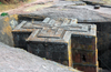 Lalibela, Amhara region, Ethiopia: Bet Giyorgis rock-hewn church, built on a three-tiered plinth in the shape of a Greek cross - photo by M.Torres