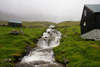 Mli, Boroy island, Noroyar, Faroes: waterfall and house in an almost abandoned village - photo by A.Ferrari