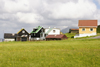 Elduvik village, Eysturoy island, Faroes: field and village houses - photo by A.Ferrari