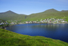 Sandavgur, Vgar island, Faroes: the village and verdant hillsides around the inlet - photo by A.Ferrari