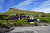 Leynar village, Streymoy island, Faroes: view from the beach - houses and Satan peak - municipality of Kvvkar - photo by A.Ferrari