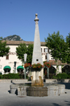 Castellane, Alpes de Haute Provence, PACA: obelisk-fountain - Marcel Sauvaire square - photo by C.Blam