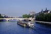 Paris, France: a tugboat pushes a barge under the Carrousel Bridge which spans the river Seine in front of the Louvre Museum - 1er arrondissement - photo by C.Lovell