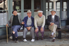 Vaucluse, PACA, France: four elderly Frenchman share a park bench - photo by C.Lovell