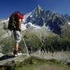 France  - Petit Dru / Petit Aiguille du Dru, Haute-Savoie, Rhone-Alpes: a hiker at mountain-station Le Montevers looks at the Petit Dry - west ridge of the Aiguille Verte, Graian Alps - photo by W.Allgower