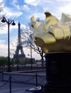 France - Paris: Eiffel tower and liberty flame - photo by K.White