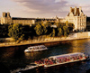 France - Paris: bateau mouche near the Louvre - Banks of the Seine, UNESCO world heritage site - photo by Hy Waxman