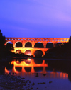Gard, Languedoc-Roussillon, France: Pont du Gard at night - highest aqueduct the Roman world - Roman engineering over the gorge of the Gardon river - Unesco world heritage site - photo by A.Bartel