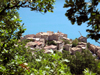 Sainte-Croix-du-Verdon, Alpes-de-Haute-Provence, PACA, France: the village towers over the lac de Sainte-Croix - framed by vegetation - photo by T.Marshall
