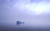 28 Franz Josef Land: Distant Iceberg in clearing fog - photo by B.Cain