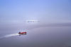 92 Franz Josef Land: Zodiac and iceberg - photo by B.Cain