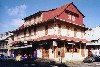 French Guiana - Cayenne / CAY: house on Lalouett st with characteristic broad eaved shade roof  (photo by Bernar Cloutier)