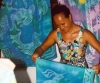 French Polynesia - Fatu Hiva island - Marquesas: seller of batik sarongs (photo by G.Frysinger)