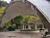 Georgia - Borjomi: parabolic concrete arch over a mineral water fountain - Mineral Water Park (photo by Austin Kilroy)