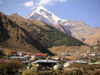 Georgia - Kazbegi / Stepantsminda: view from the town square - Mt Kazbek and Gergeti - Georgian Military Highway - the mountain where Prometheus was chained - photo by Austin Kilroy)