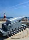 Gibraltar: 12.5 inch 38 ton Rifled Muzzle Loading (RML) gun at Harding's Battery and Europa Point Lighthouse - Straits of Gibraltar -  photo by M.Torres
