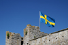Gotland - Visby: Swedish flag on a tower of the eastern wall - photo by A.Ferrari