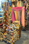 Greece, Rhodes, Old Town:richly coloured fabric wares on sale in an Old Town shop - photo by P.Hellander