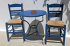 Greece, Dodecanese Islands,Kos: two chairs and table against wall - photo by P.Hellander