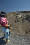Greece, Cyclades, Santorini: a visitor (LPI photographer Stella Hellander) stares into the caldera inthe centre of Megali Kameni - photo by P.Hellander