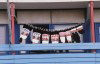 Greenland - Qaqortoq: national costume leg adornment hung on the line to dry (photo by G.Frysinger)