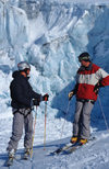 Greenland, Apussuit: two skiers resting on the glacier - photo by S.Egeberg
