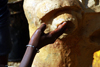 Bissau, Guinea Bissau / Guin Bissau: Cho de Papel Varela quarter, Carnival Masks, man sculpting a mask / Bairro Cho de Papel Varela, mscaras de Carnaval, preparao, homem a esculpir uma mscara - photo by R.V.Lopes