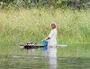 Demerara River: woman doing the washing (photo by G.Frysinger)