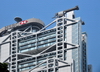 Chinese black Kite (Milvus migrans), Hong Kong, China. top of skyscraper - photo by B.Henry