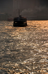 Hong Kong: Kowloon ferry - water with sun reflections - photo by M.Torres