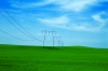 Hungary / Ungarn / Magyarorszg - Lake Balaton: pylons and power lines - green fields and sky (photo by P.Gustafson)