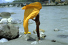 India - Uttaranchal - Rishikesh: Hindu pilgrim after a ritual bath in the Ganges river - photo by W.Allgwer