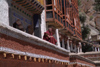 India - Ladakh - Jammu and Kashmir: Tikse gompa - monk on the faade - photos of Asia by Ade Summers
