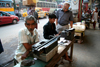 Calcutta / Kolkata, West Bengal, India: a writer waiting for customers in the streets - typewriter - photo by G.Koelman