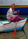 Sunda Kelapa, South Jakarta, Indonesia - man rowing - old port of Sunda Kelapa - photo by B.Henry