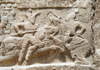 Iran - Naqsh-e Rustam: Equestrian relief of Bahram II, below tomb of Darius II Nothus - His enemy wears a Roman helmet and may be an emperor - photo by M.Torres