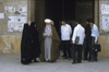 Iran - Qom: mullah - a Shia cleric speaks to members of his congregation - photo by W.Allgower