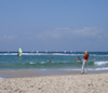 Israel - Kibbutz Sdot Yam: photographer at work - beach - photo by Efi Keren