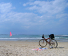 Israel - Kibbutz Sdot Yam: waiting for its master - bike on the beach - photo by Efi Keren