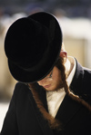 Israel - Jerusalem - young Orthodox Jew with side curls and hat praying - photo by Walter G. Allgwer