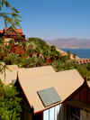 Eilat, South district, Israel: bungalows and the Red sea - Eilat gulf - photo by E.Keren