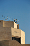 Jerusalem, Israel: Hecht Synagogue, stone facade with a menorah, architect Ron Carmi / Ram Karmi, built like a fortress on atop Mount Scopus, part of the Faculty of Humanities, Hebrew University - Beit midrash - Daily Prayer Services, Shacharit, Rosh Chodesh, Mincha, Maariv - photo by M.Torres