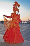 Carnival participant with Carnival costume at Dawn by Canale di San Marco, Venice - photo by A.Beaton