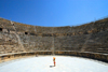 Jerash - Jordan: South theatre - girl with umbrella hat - Roman city of Gerasa - photo by M.Torres