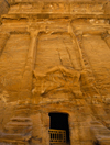 Jordan - Petra: eroded facade, with four columns - Street of Facades - Outer Siq - photo by M.Torres